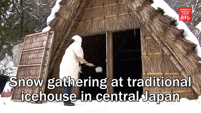 Snow gathering at traditional icehouse in central Japan