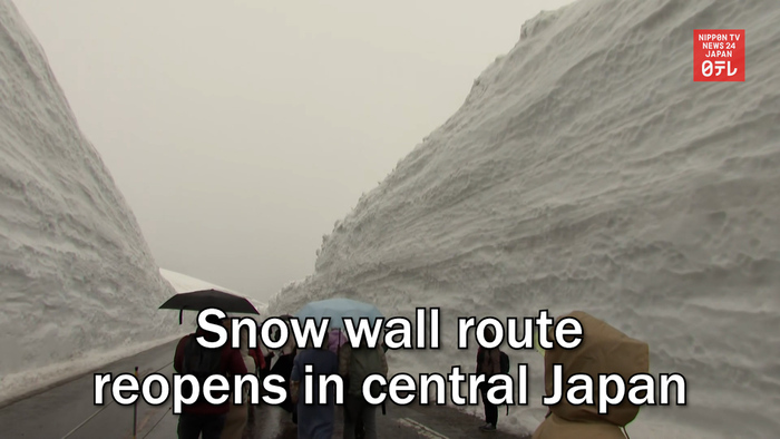 Snow wall route reopens in central Japan
