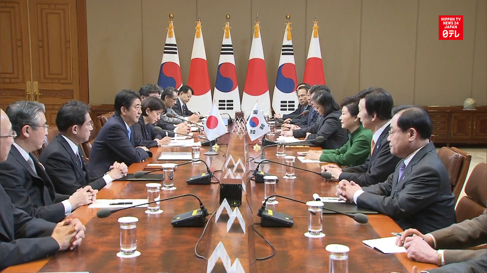 Japan-South Korea summit signals thaw 