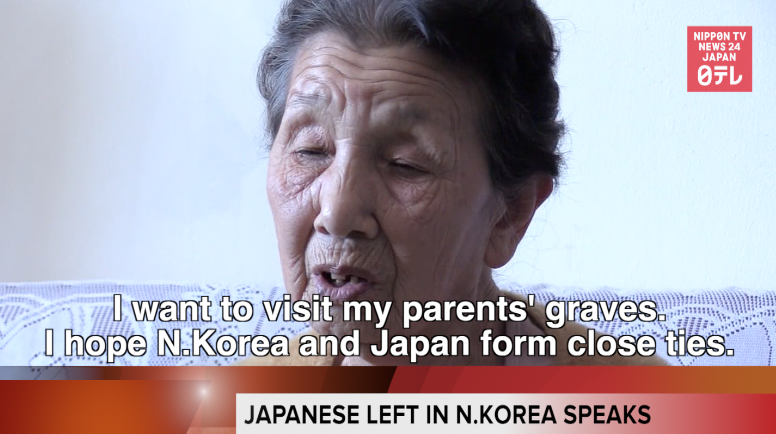 Japanese woman left in North Korea meets press