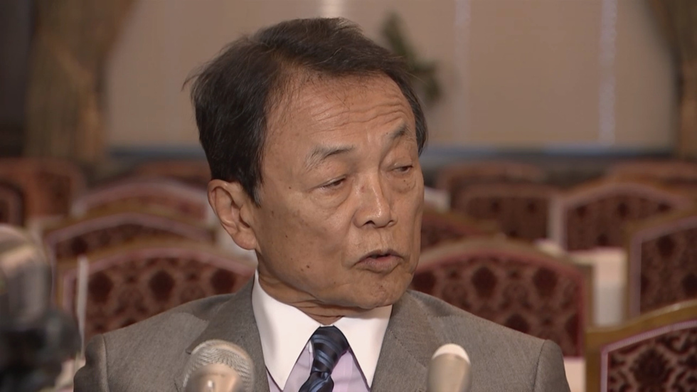 Aso apologizes for vice minister's sexual harassment