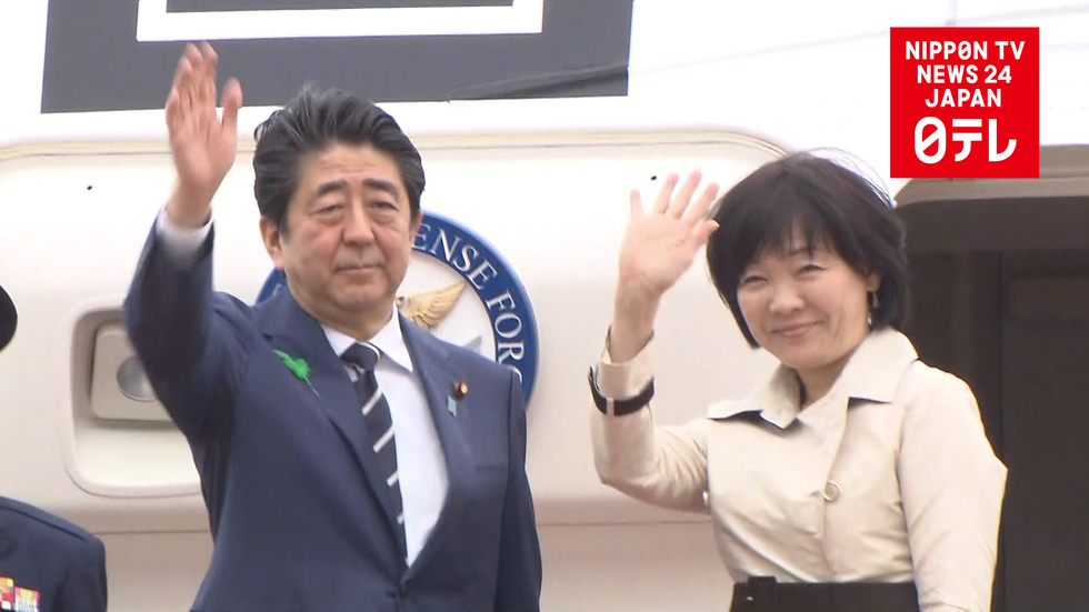 Abe leaves for talks with Trump