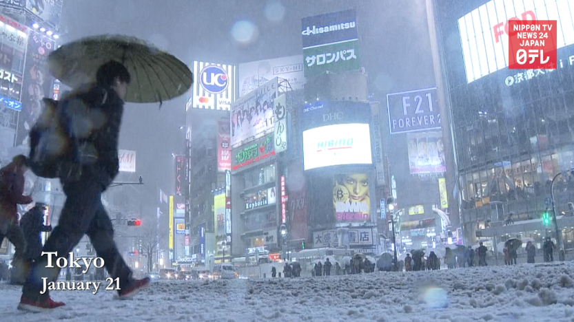 Heavy snow snarls Tokyo commuters