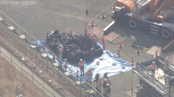 Fukushima waste removal begins amid challenges
