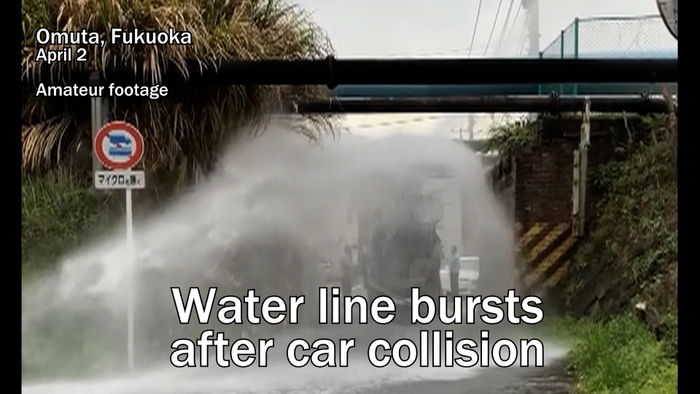 Water line bursts due to car collision in southwestern Japan