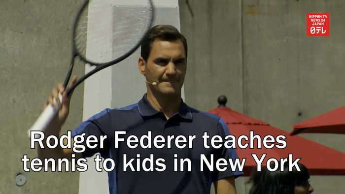 Rodger Federer teaches tennis to kids in New York