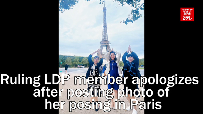 Ruling party member apologizes after posting photo of her posing in front of Eiffel Tower