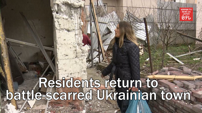 Residents return to battle-scarred Ukrainian town of Irpin