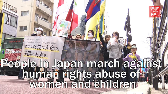 Foreign nationals in Japan march against human rights abuse of women and children