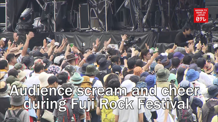 Audience scream and cheer during Fuji Rock Festival for the first time in four years