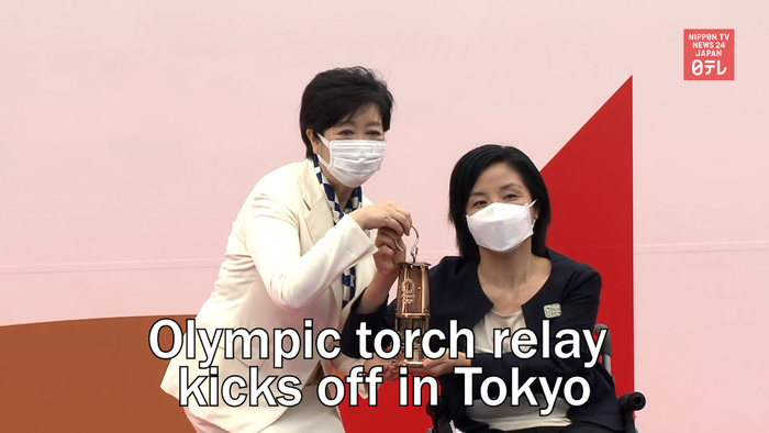 Muted Olympic torch relay kicks off in Tokyo