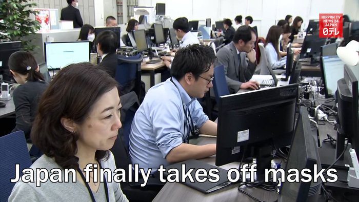Japan finally takes off masks 