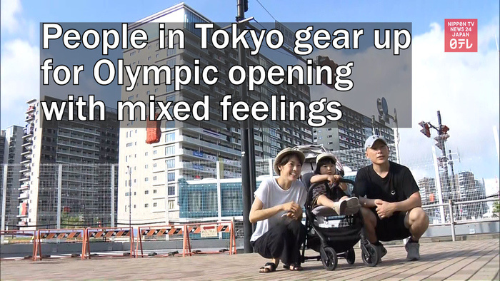 People in Tokyo gear up for Olympic opening with mixed feelings
