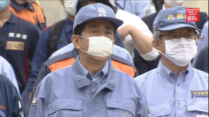 Japan PM vows aid to rain-battered Kumamoto