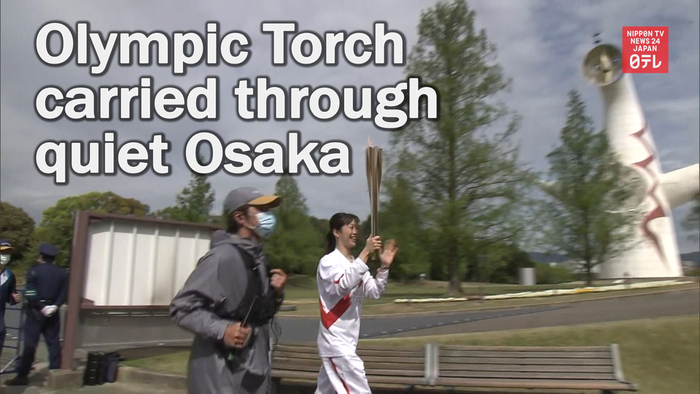 Olympic Torch carried through quiet Osaka