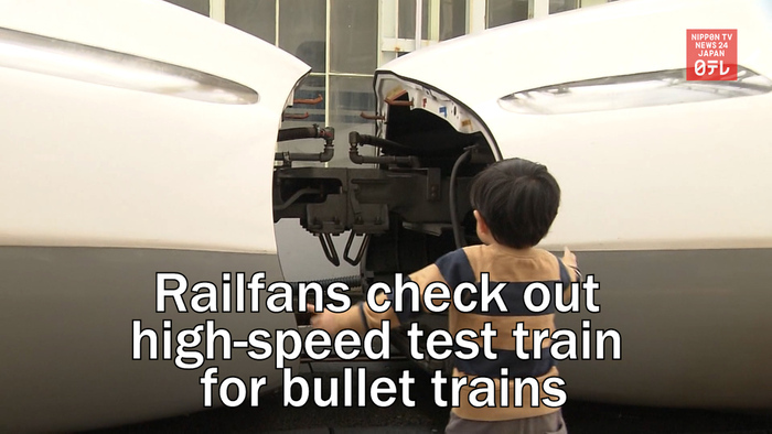 Railfans check out high-speed test train for bullet trains