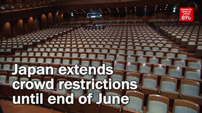 Japan extends crowd restrictions until end of June