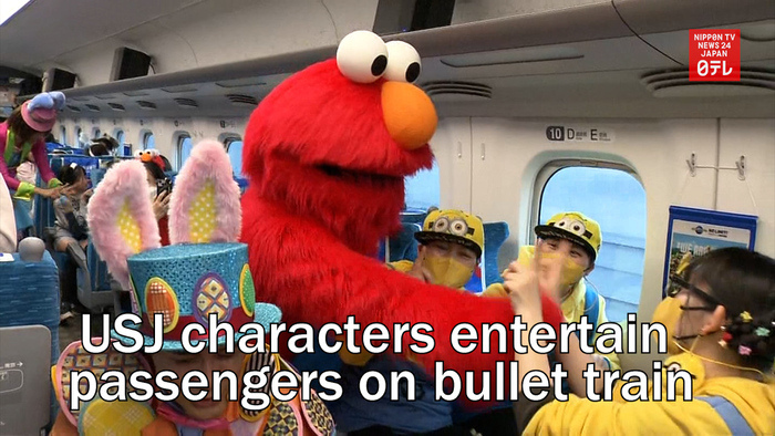 Universal Studios Japan characters entertain passengers on bullet train