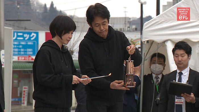 Japan to scale down Olympic torch relay to lantern tour
