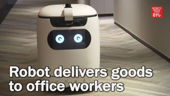 Autonomous robot delivers goods to office workers