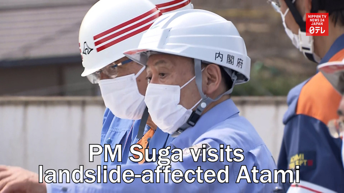 PM Suga visits landslide-affected Atami