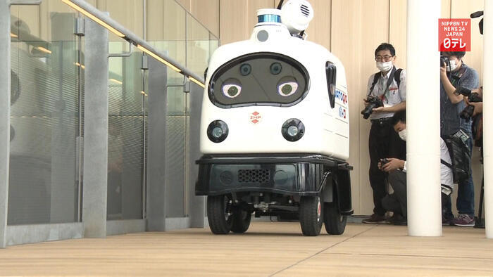 Disinfectant robots tested at Tokyo's new railroad station amid pandemic