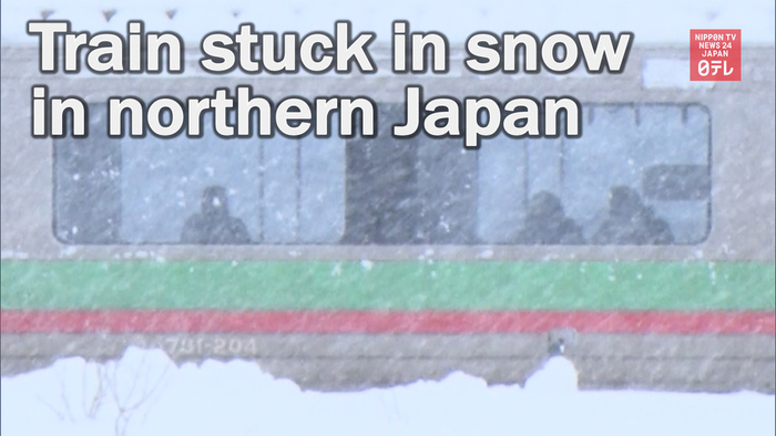 Train stuck in snow in northern Japan