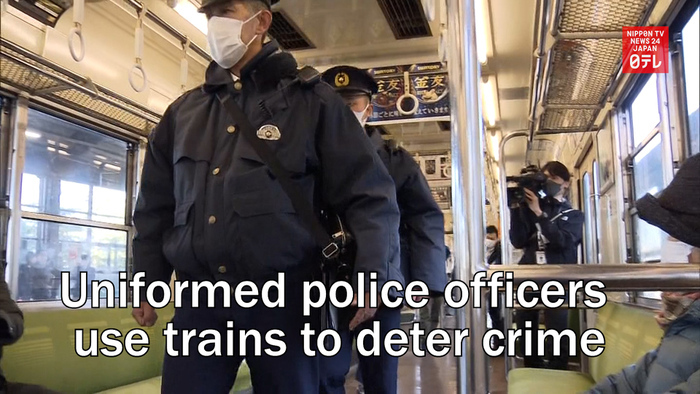 Uniformed police officers use trains to deter crime
