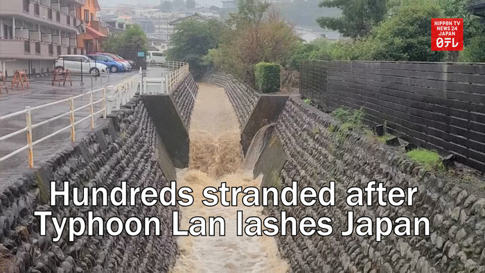 Hundreds stranded after Typhoon Lan lashes Japan with heavy rain