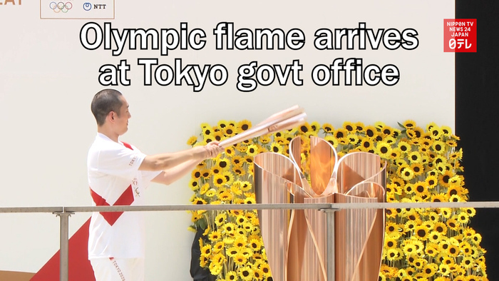 Olympic flame arrives at Tokyo Metropolitan Government office