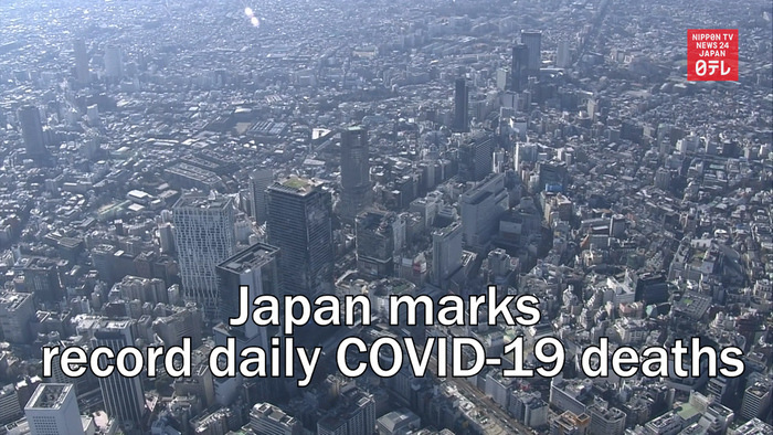 Japan marks record 420 COVID-19 deaths