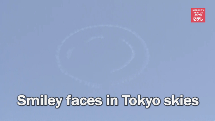 Smiley faces in Tokyo skies