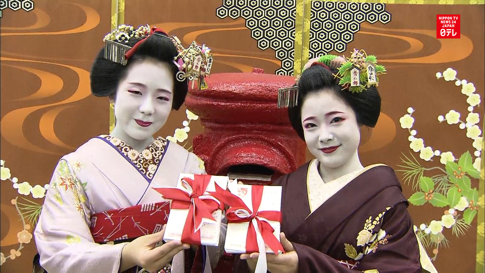 Geisha kick off New Year card season