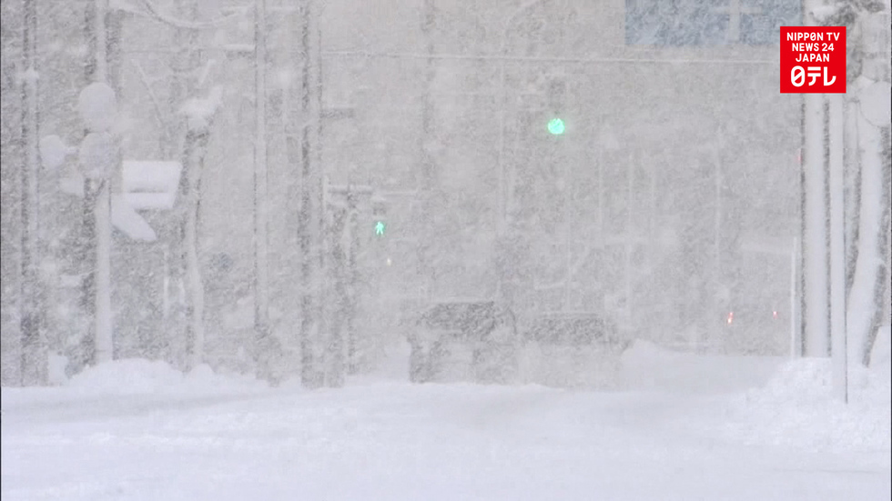 Developing lows bring blizzard to northern Japan