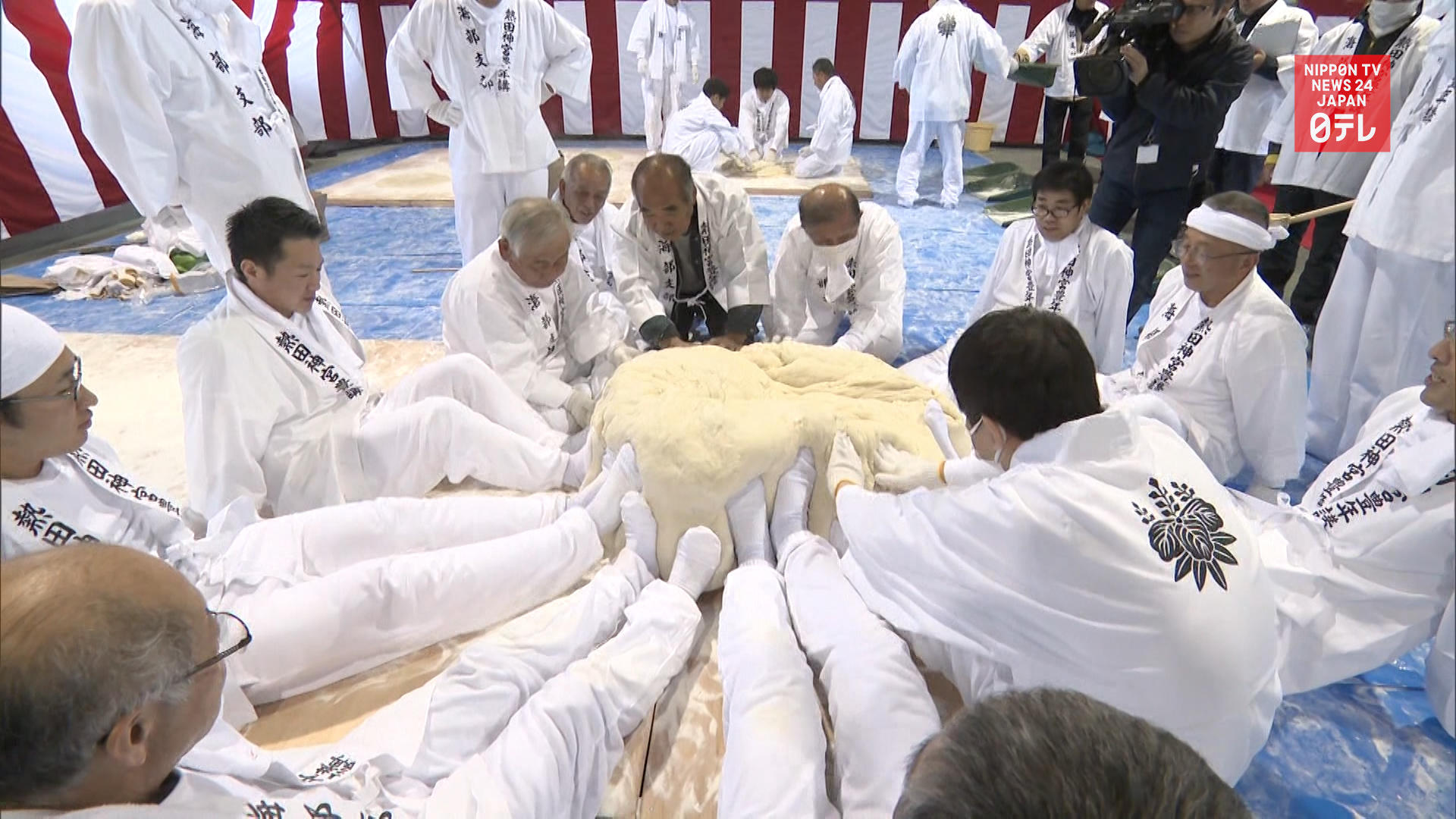 Giant rice cake making for deities