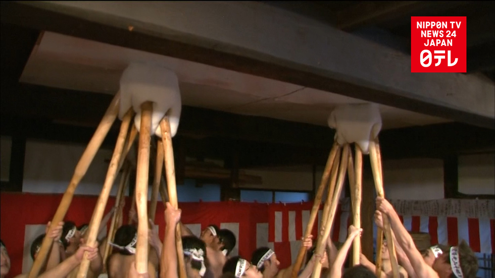 Naked rice-pounding for good fortune