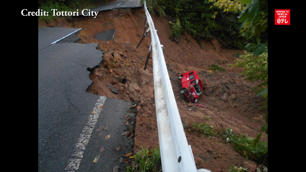 Postal vehicle plunges from fissure