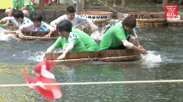 Tub race fascinates in northern Japan