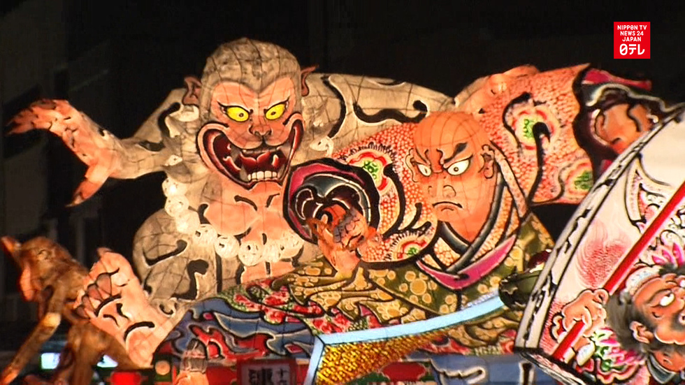 Illuminated floats on parade at Hirosaki Neputa