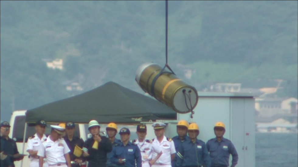 SDF crane drops missile part
