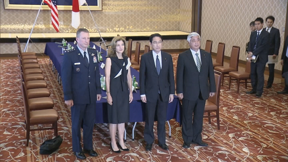 Officials agree to revise base worker status agreement