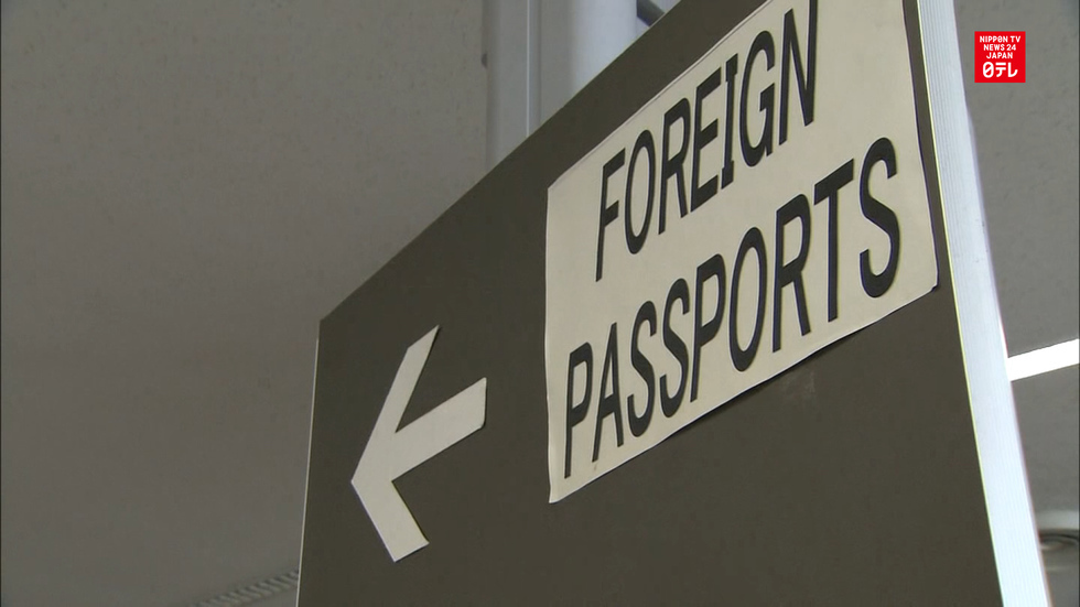 Police arrest man for fake passport