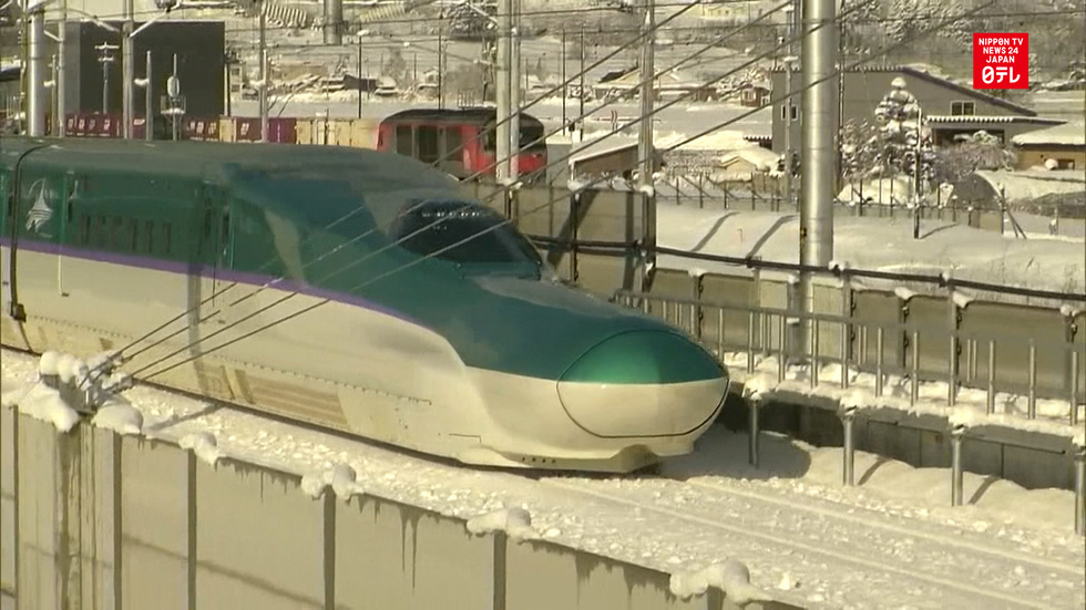 Reporters test ride new bullet train