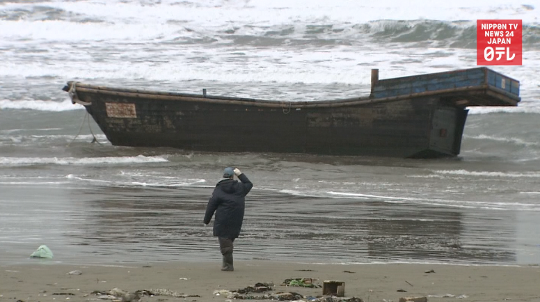 Wood boat found with 8 bodies  