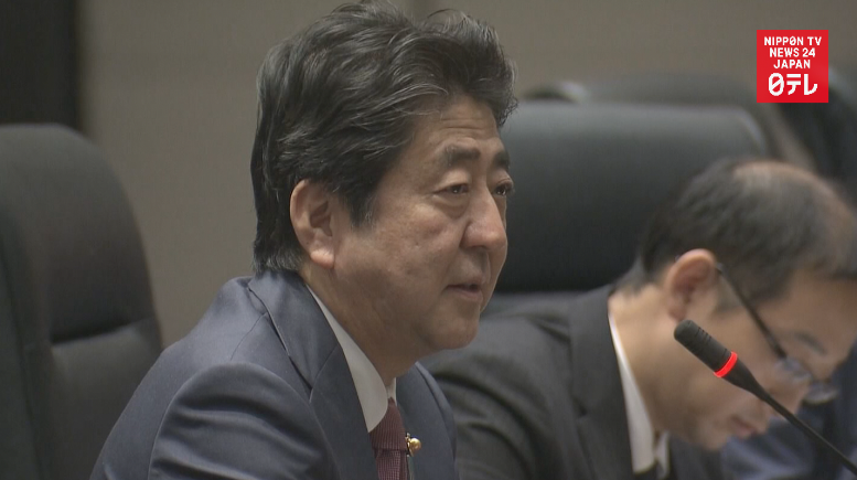 Abe, Li move to improve ties 