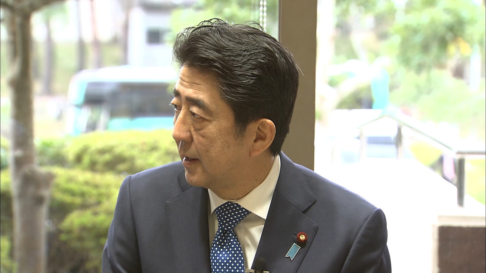 PM Abe visits Fukushima towns