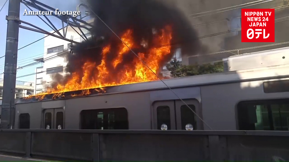 Tokyo train catches fire