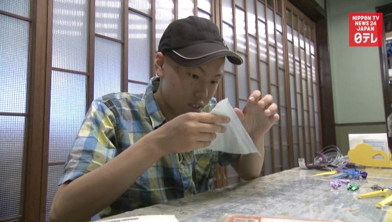 Autistic man finds purpose in origami 