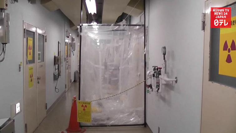 Radiation exposure estimate lowered for 5 workers 