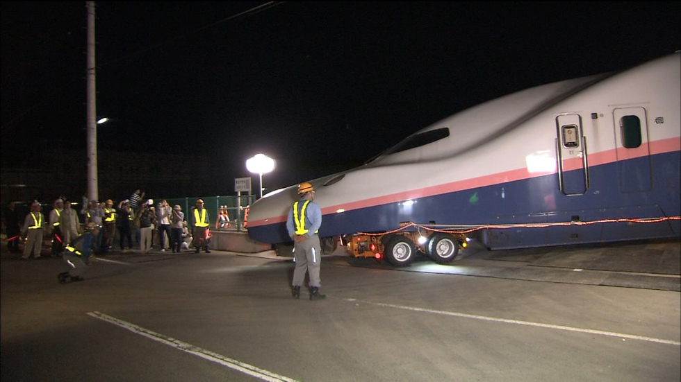 Bullet train cars on the road